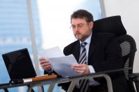 Man at desk with computer