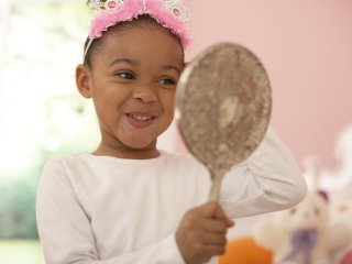 Child Looking in a Mirror