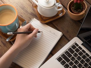 Photo of laptop and notebook